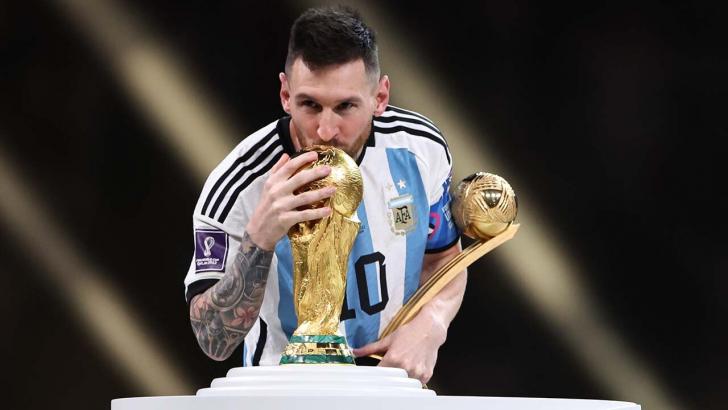 Argentina captain Lionel Messi kisses World Cup trophy